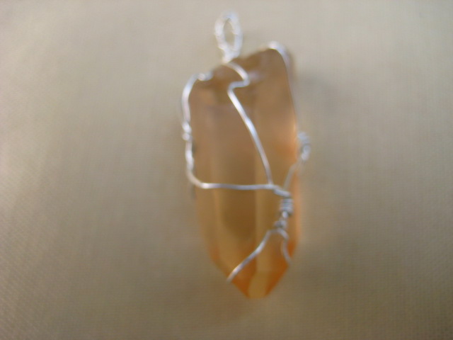 Golden Lemurian Pendant increases flow of chi all over the body 2671